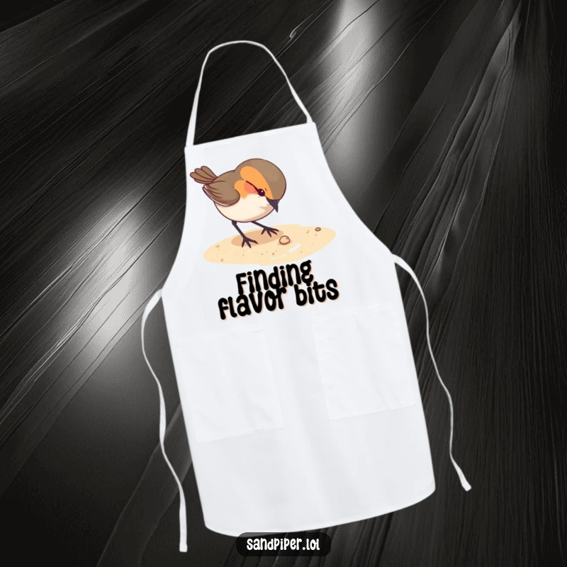 Funny apron depicting a curious bird pecking at something tiny on the sandy ground, perfect for kitchen curiosity.