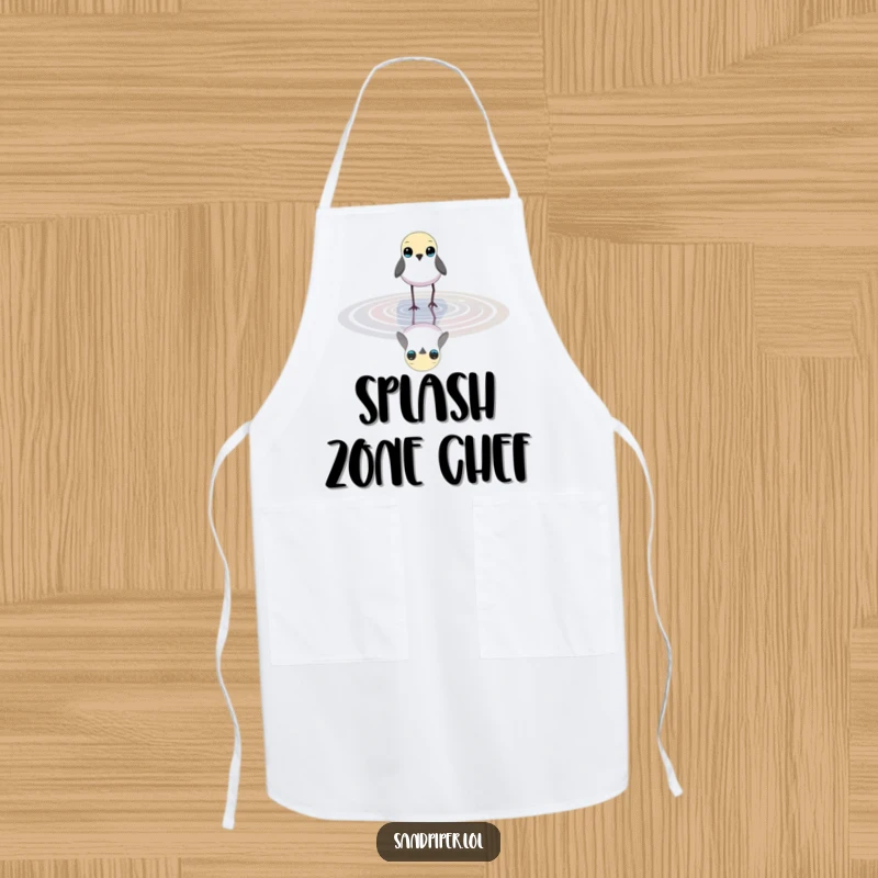 Funny apron depicting a small bird wading in shallow water, perfect for peaceful kitchen activities.