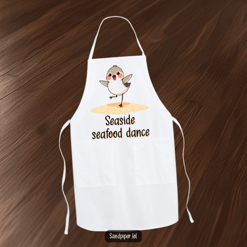 Funny sandpiper apron showing a bird happily dancing in the kitchen, a humorous addition for any cook or bird enthusiast