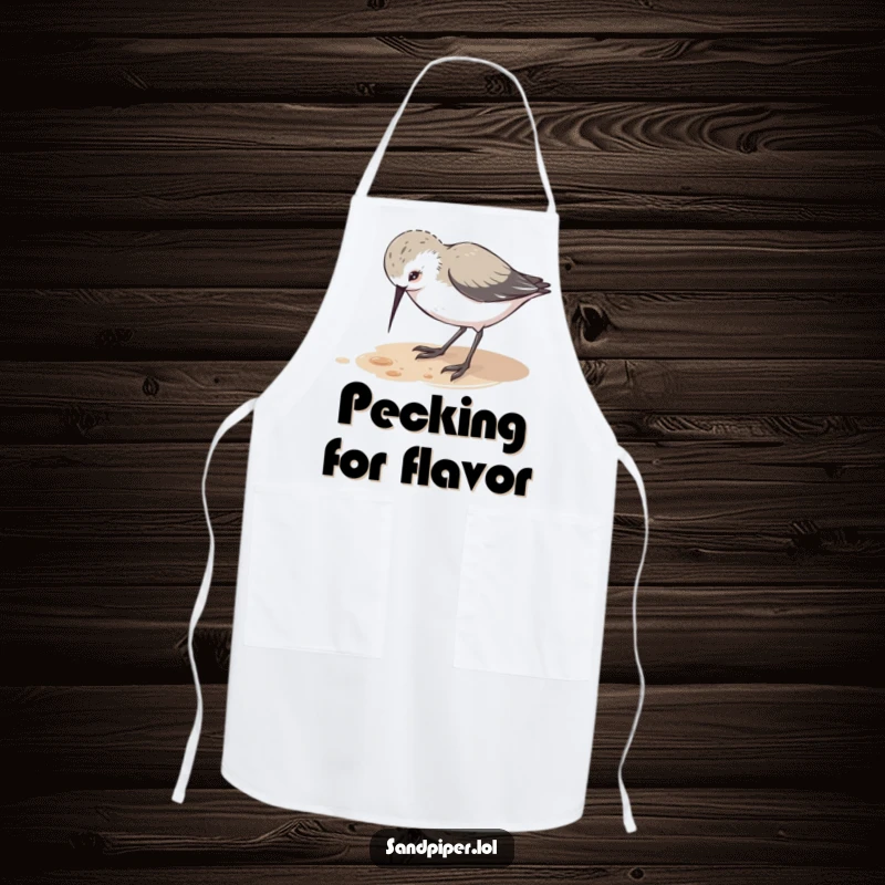 Funny apron showcasing a cute sandpiper character pecking at the ground with playful curiosity, ideal for kitchen exploration.