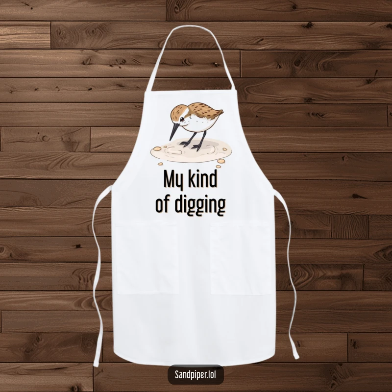 Funny Sandpiper Digging Apron: A sandpiper happily digs its beak into wet sand, adding funny beach vibes to kitchen protection.