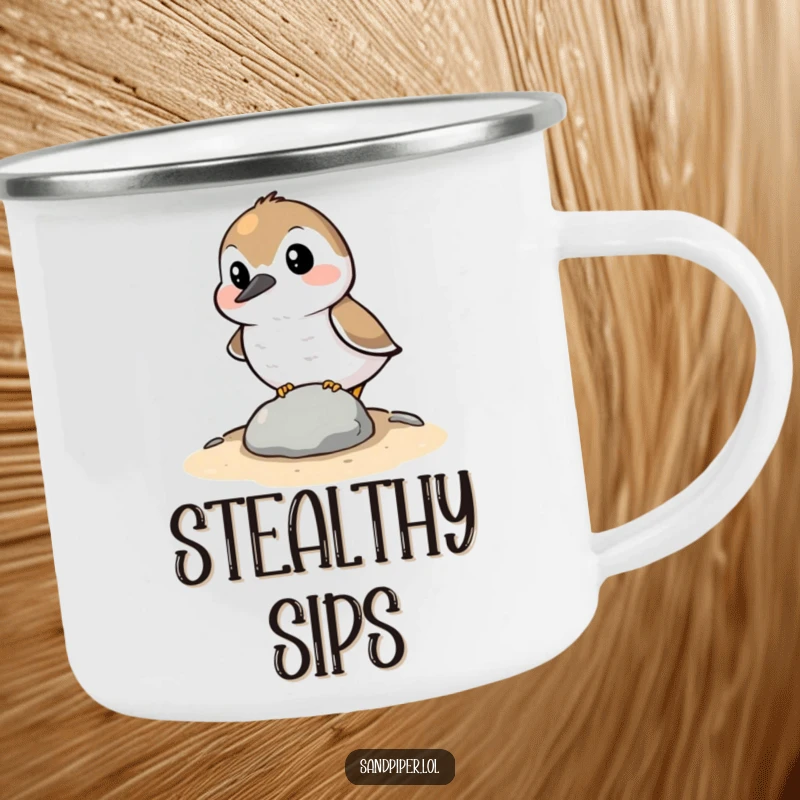Funny Camping Mug: A sandpiper character comically attempting to hide behind a small stone, symbolizing stealth and shy humor outdoors.