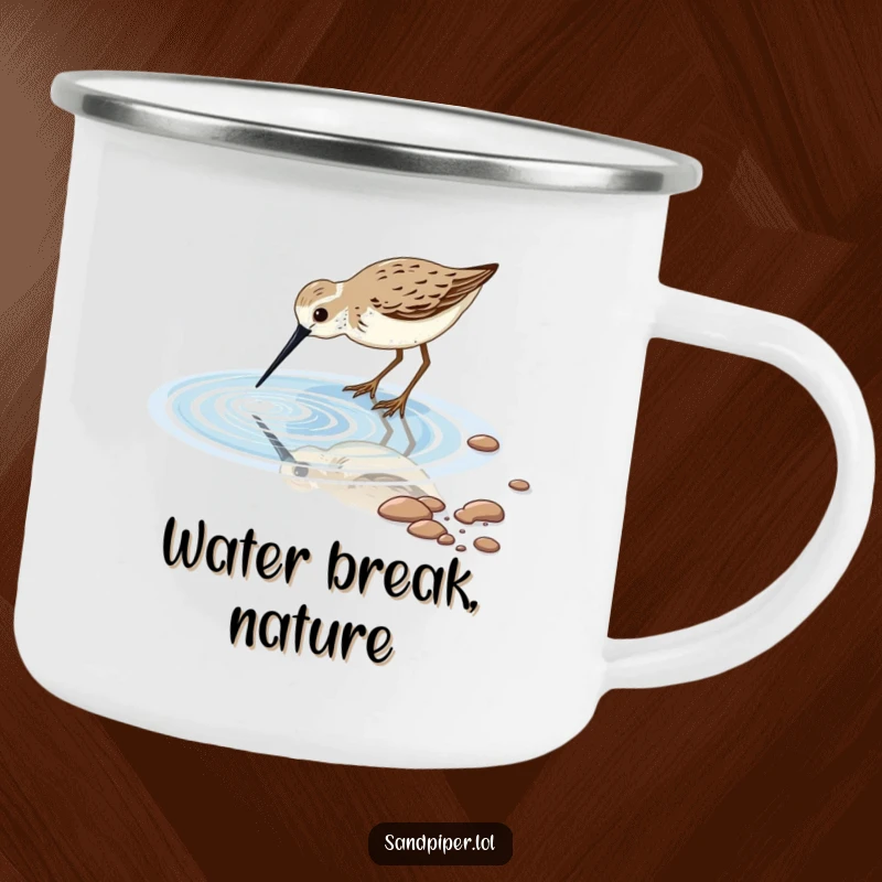 Durable camping mug featuring a sandpiper bird dipping its beak into a sparkling tidal pool, perfect for serene outdoor enjoyment.