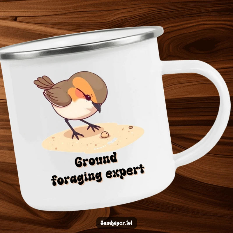 Funny camping mug with a curious bird pecking at something tiny on the sandy ground, perfect for curious outdoor enjoyment.