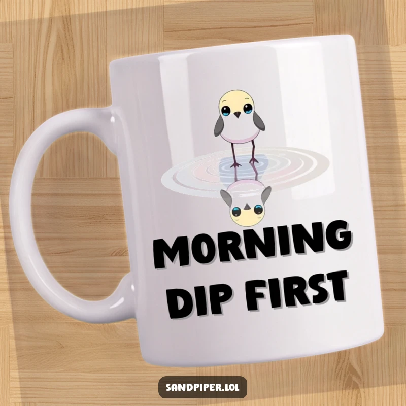 Funny mug showing a small, slender bird with bright eyes calmly wading in shallow water, evoking peace.