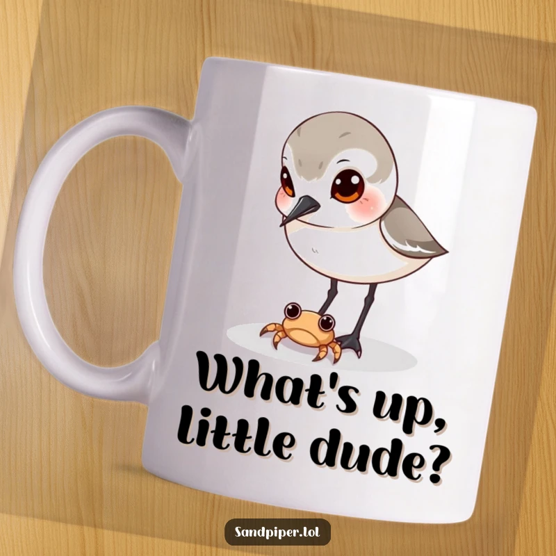 Funny sandpiper mug, curious bird observing tiny crab, beach scene, humorous interaction, perfect gift for bird lovers.