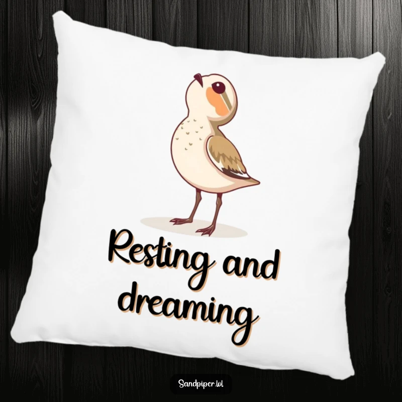 Funny pillow featuring a sandpiper gazing up at the sky with profound wonder.