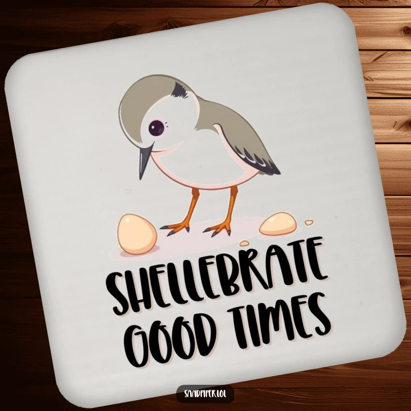 Funny drink coaster featuring a sandpiper character inquisitively pecking at a small shell, adding playful, curious charm.