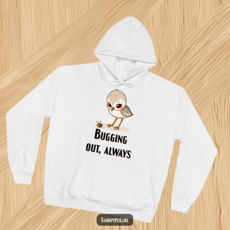 Funny Hoodie: A cute sandpiper displays intense focus while pecking at a tiny insect, embodying determination, a cozy design.