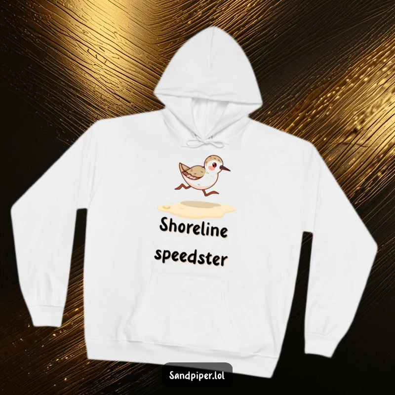 Funny Sandpiper Runner Hoodie: Warm apparel featuring a bird running quickly on a sandy beach, radiating cheerful energy.