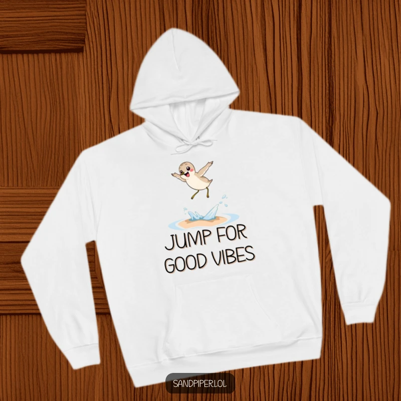 Funny sandpiper hoodie, cozy joyful bird sweatshirt, leaping over wave, humorous outerwear, unique gift for bird lovers.