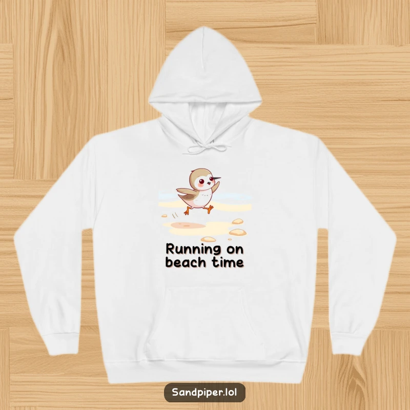 Funny Sandpiper Hoodie: Cute character depicted running swiftly along a sandy beach, perfect for nature lovers and humor seekers.