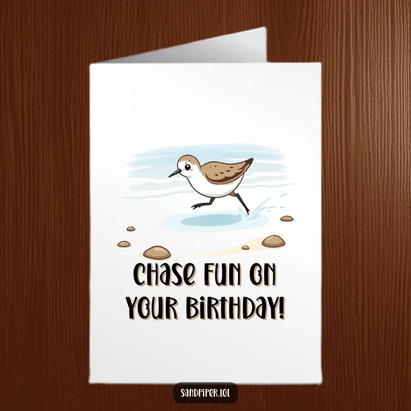 Funny Free Printable birthday card showing a sandpiper playfully chasing the ocean tide as it retreats from the shore.