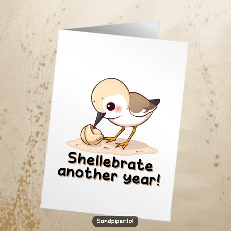 Funny free printable birthday card featuring a sandpiper bird curiously pecking at a tiny shell, a humorous downloadable greeting.