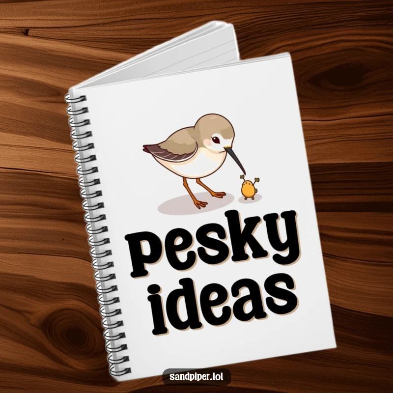 Funny notebook with a sandpiper playfully pecking at a tiny imaginary bug, perfect for jotting notes. A fun funny gift.