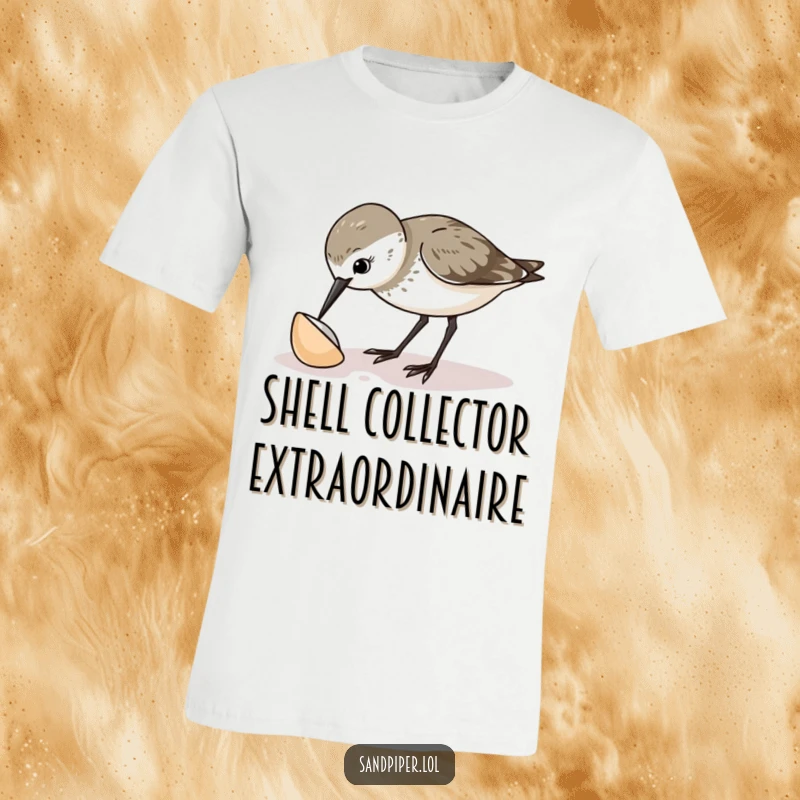 Funny sandpiper t-shirt showing a curious bird pecking at a small shell, highlighting its inquisitive and cute demeanor.