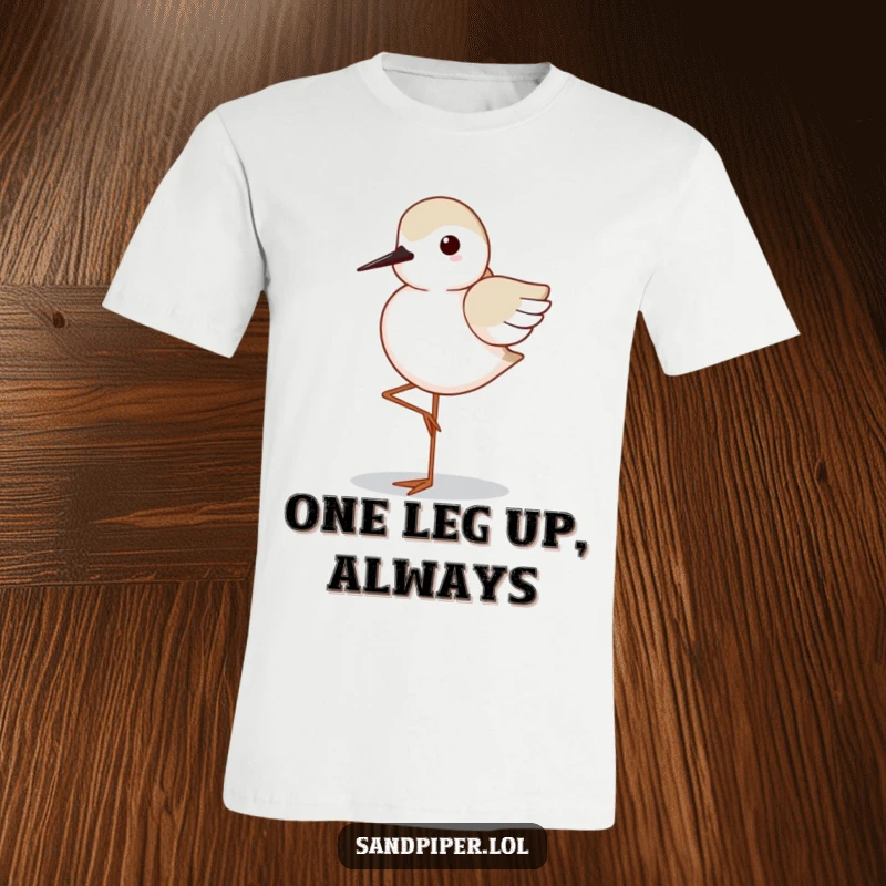 Funny Sandpiper T-Shirt: Adorable sandpiper in a perfect one-legged stance, demonstrating impressive balance and elegant wing tuck.