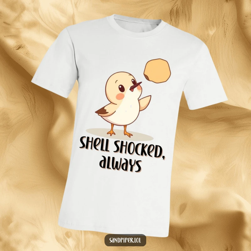 Funny T-Shirt: A cute sandpiper bird has a look of pure astonishment as it gazes upon a seashell hovering nearby.