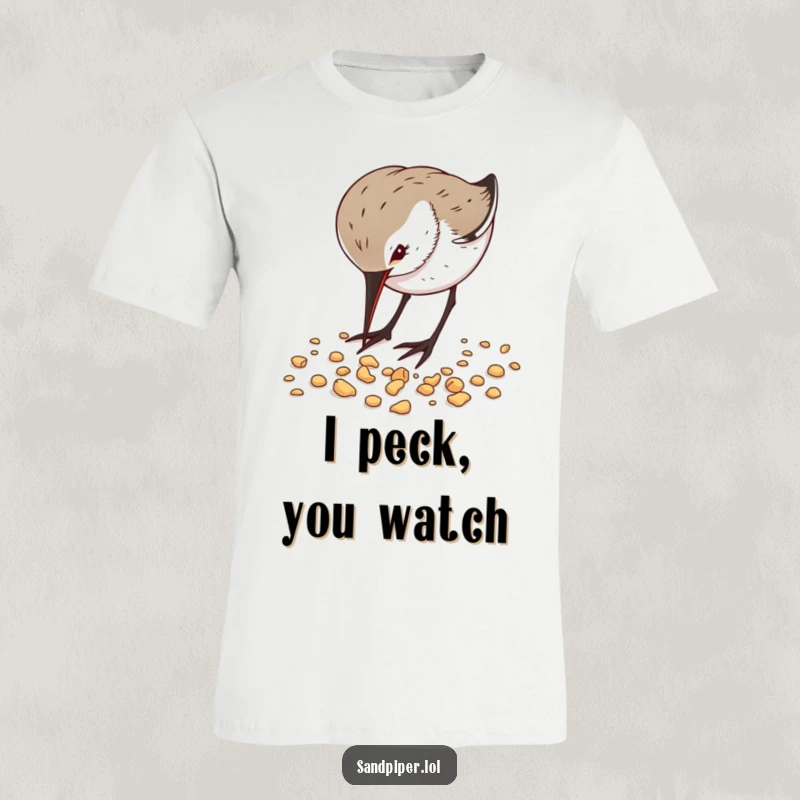 Funny T-Shirt depicting a sandpiper intently pecking at crumbs, a humorous representation of dedicated bird behavior.