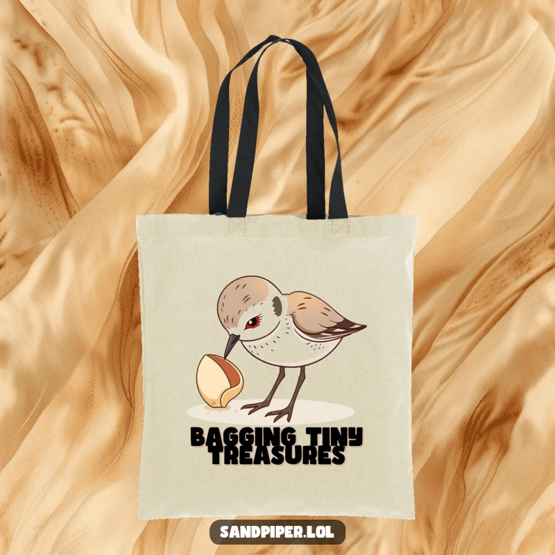 Funny tote bag with a sandpiper curiously looking down at a seashell, perfect for carrying beach finds. A practical funny gift.