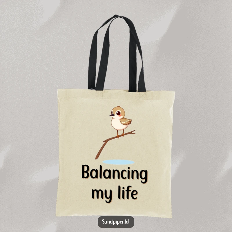 Funny sandpiper tote bag adorned with a comical bird balancing on a twig, showcasing its amusing and precarious stance.