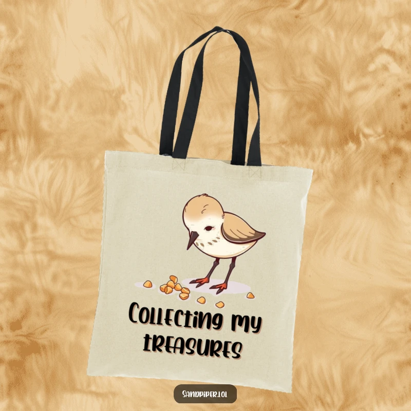 Funny tote bag showing a happy sandpiper focused on pecking at scattered crumbs.