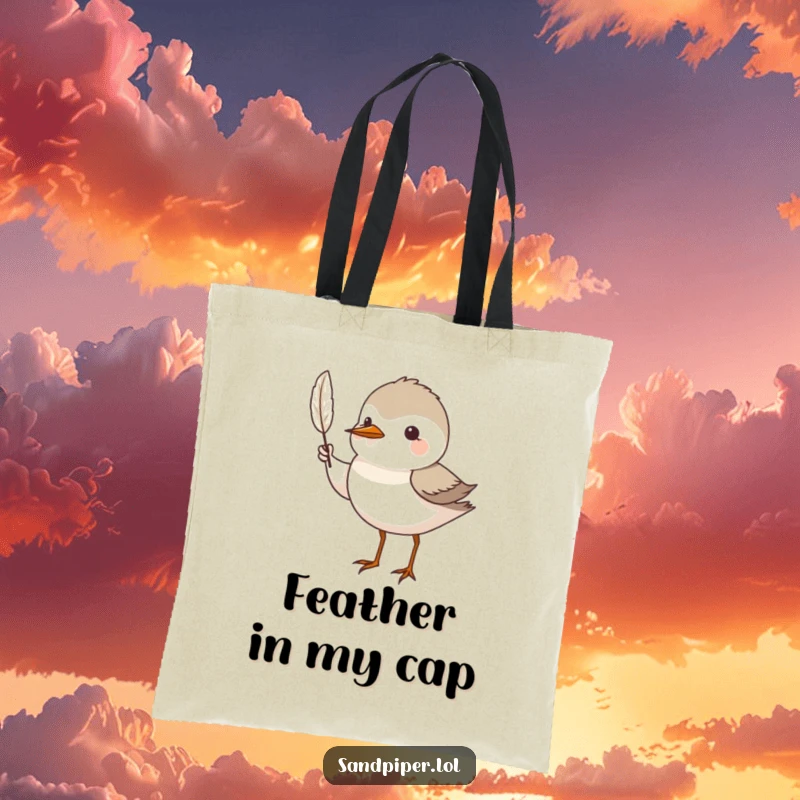 Funny Tote Bag: A sandpiper bird proudly displays a delicate feather, symbolizing found treasures and nature's beauty.