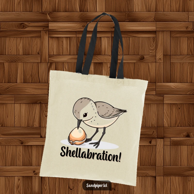 Funny sandpiper bird tote bag, curiously pecking at a shiny dropped shell, beach accessory, unique funny gift.